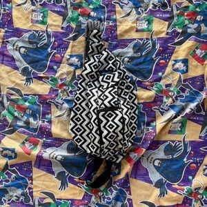 KAVU Geometric Rope Sling Bag